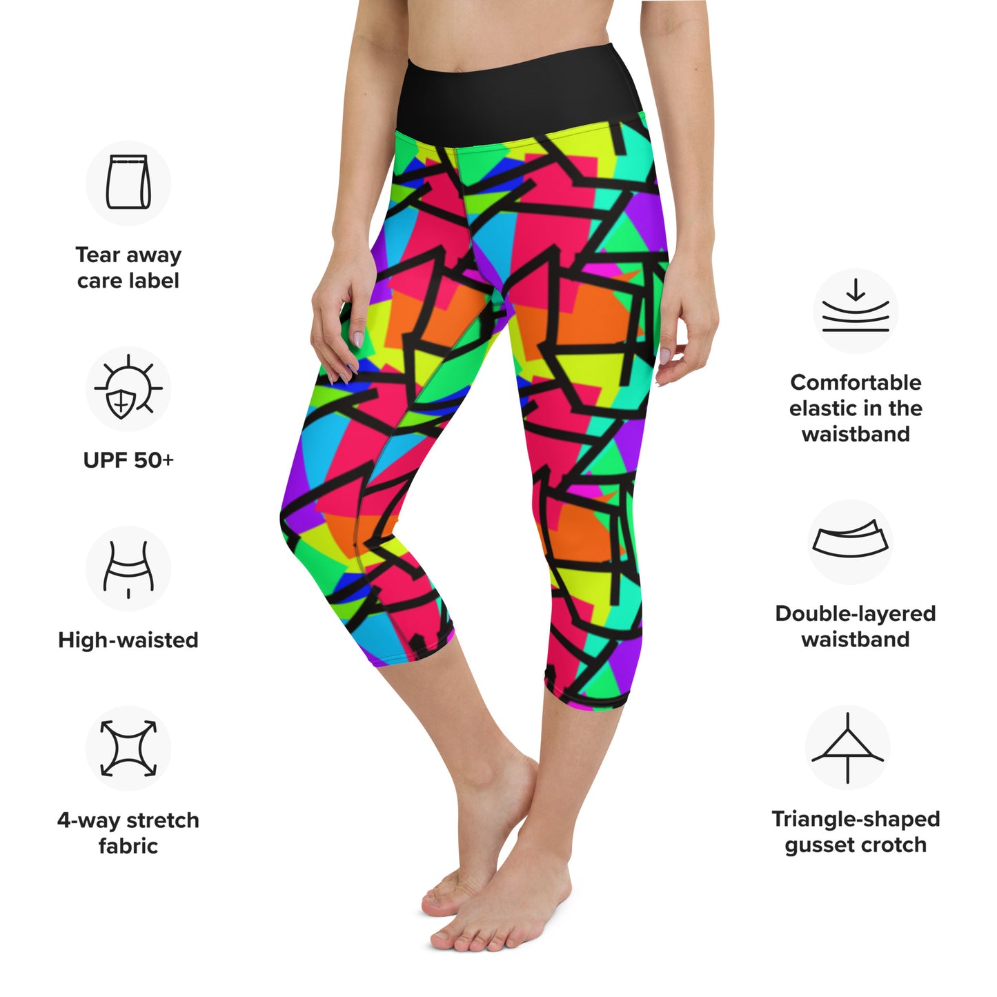 Harajuku Yume Kawaii womens yoga capri leggings in brightly coloured Pop Kei 80s Memphis design in red, orange, green, purple, yellow and turquoise geometric shapes and a black zigzag overlay on these neon funky running tights for women. High waist.