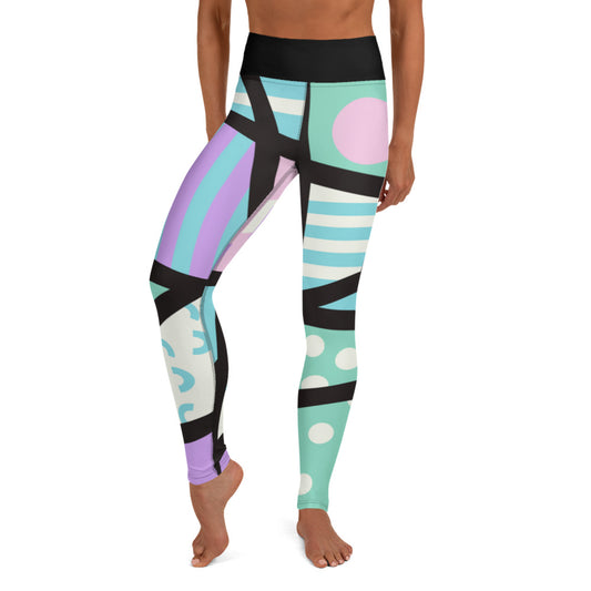 Colorful yoga leggings for women with a ankle length leg and black high waistband. Geometric shapes and pattern in a Harajuku and 80s Memphis style print. These yami kawaii printed workout leggings are beautifully designed in pastel pink, purple and green.