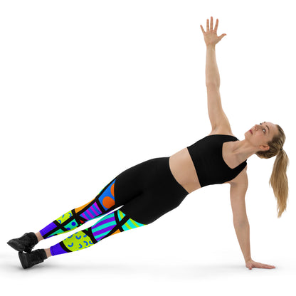 Sports leggings for women with black upper top and geometric rainbow patterned legs. Compression ankle length gym leggings with high elasticated waistband. Non-see through and squat proof leggings.