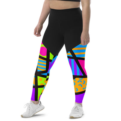 Sports leggings for women with black upper top and geometric popping patterned legs. Compression ankle length gym leggings with high elasticated waistband. Non-see through and squat proof leggings.