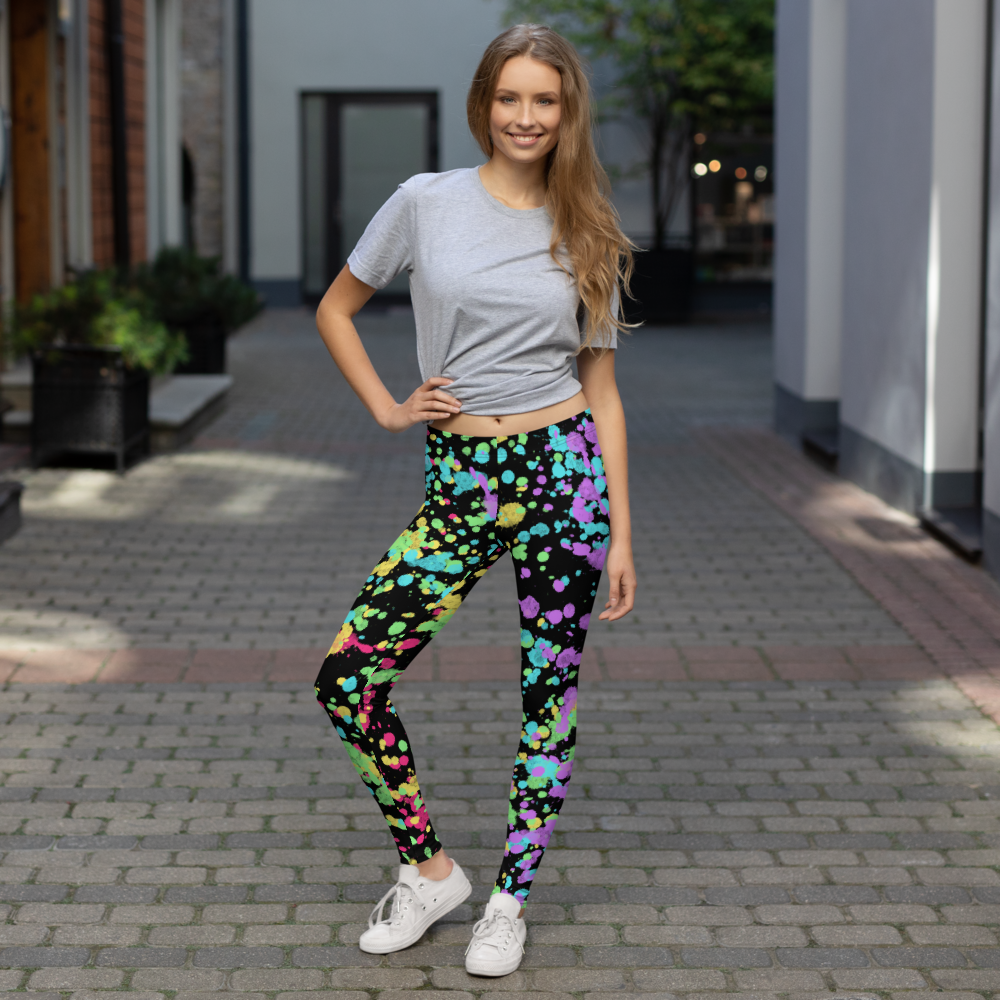 LGBTQ Gay Pride Rainbow Flag ink splats gym leggings for women with red, yellow, blue., green and purple splatters against a black background on these unique and best running tights, Gay Pride and festival leggings for women