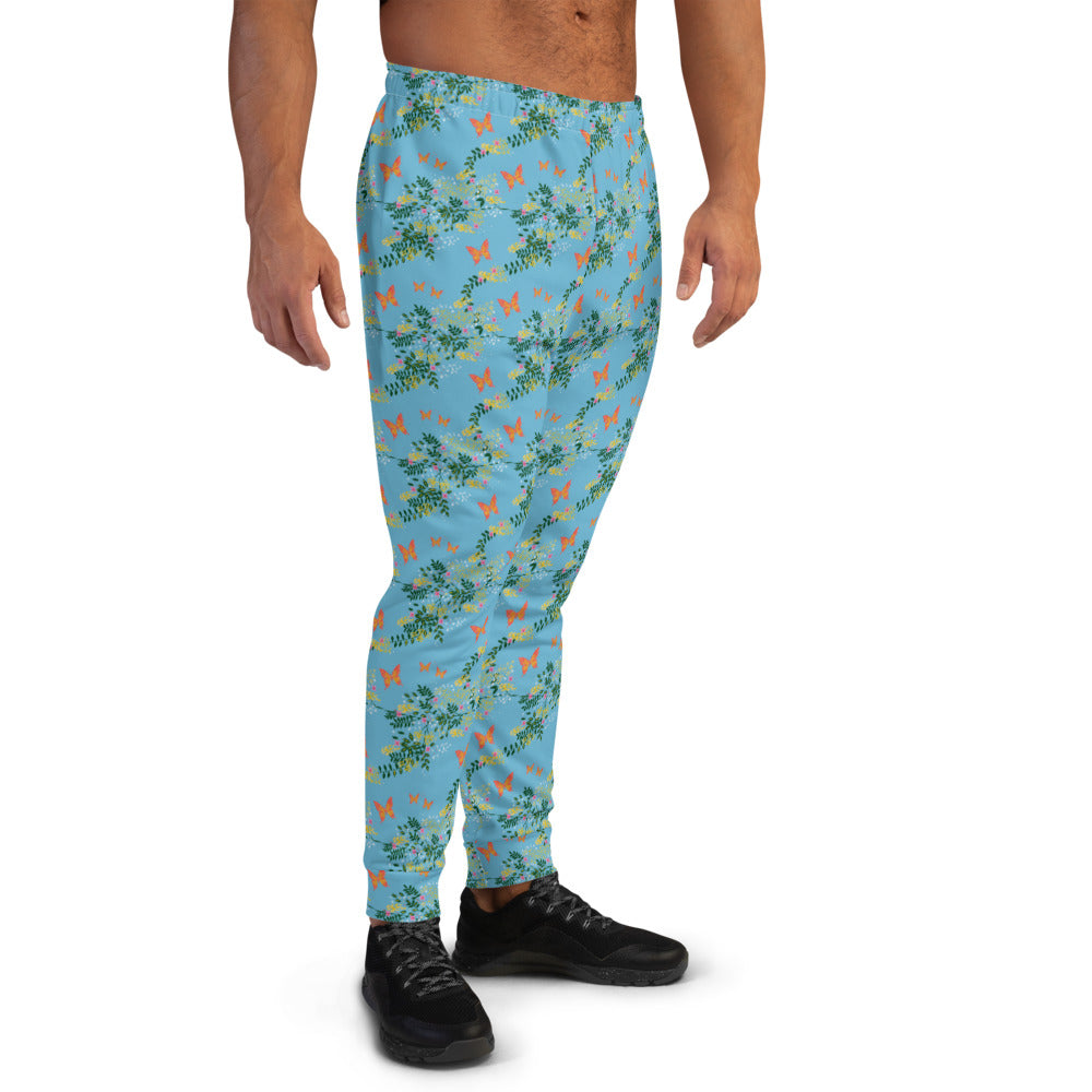 Traditional English Cottagecore patterned design featuring orange butterflies, leaves and flowers on this all-over print men's joggers and sweatpants by BillingtonPix