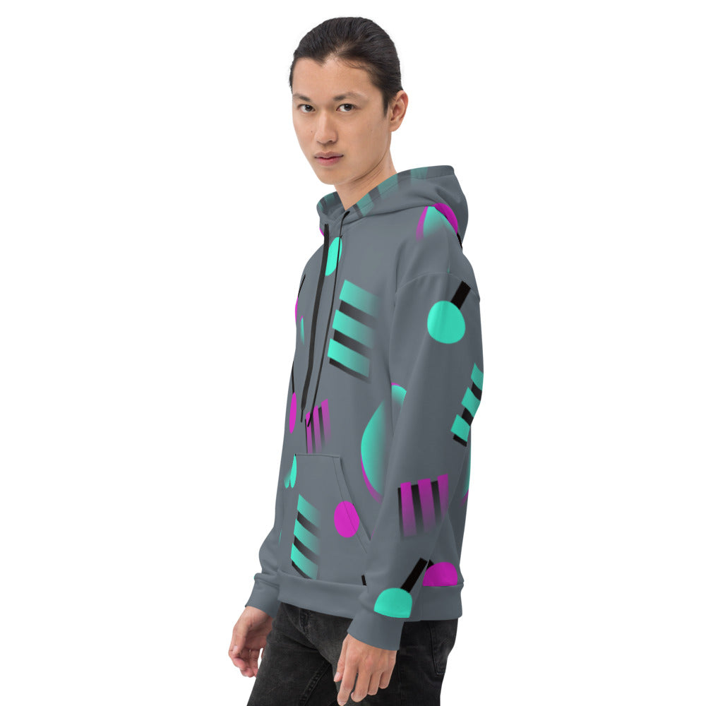 Colourful grey hoodie with an 80s Memphis and 90s Vaporwave inspired geometric pattern, consisting of large circular and square shapes in pink and mint against a blue background on this hoodie pullover by BillingtonPix