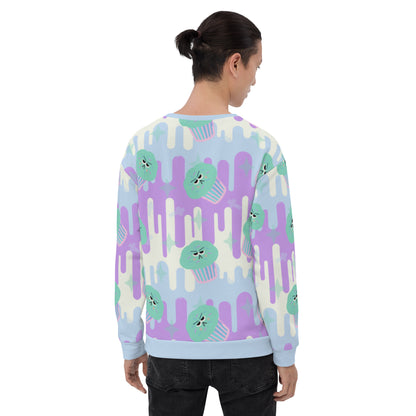 Fairy Kei sweater in Japanese Harajuku style with green frosted cupcakes against a drip background in pastel tones of blue, purple and cream and with translucent sprinkles of confetti on this unisex sweatshirt by BillingtonPix