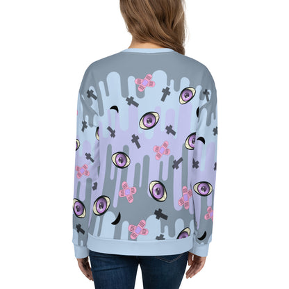 Patterned unisex sweatshirt in a Yami Kawaii Harajuku Pastel Goth aesthetic featuring spooky eyeballs, moons, crosses and sticking plasters for a Menhera Kei fashion look on this pastel colored drip patterned sweater by BillingtonPix