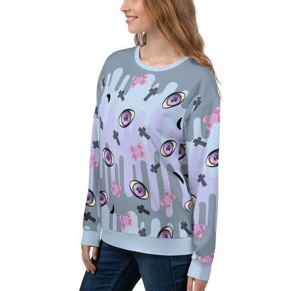 Patterned unisex sweatshirt in a Yami Kawaii Harajuku Pastel Goth aesthetic featuring spooky eyeballs, moons, crosses and sticking plasters for a Menhera Kei fashion look on this pastel colored drip patterned sweater by BillingtonPix