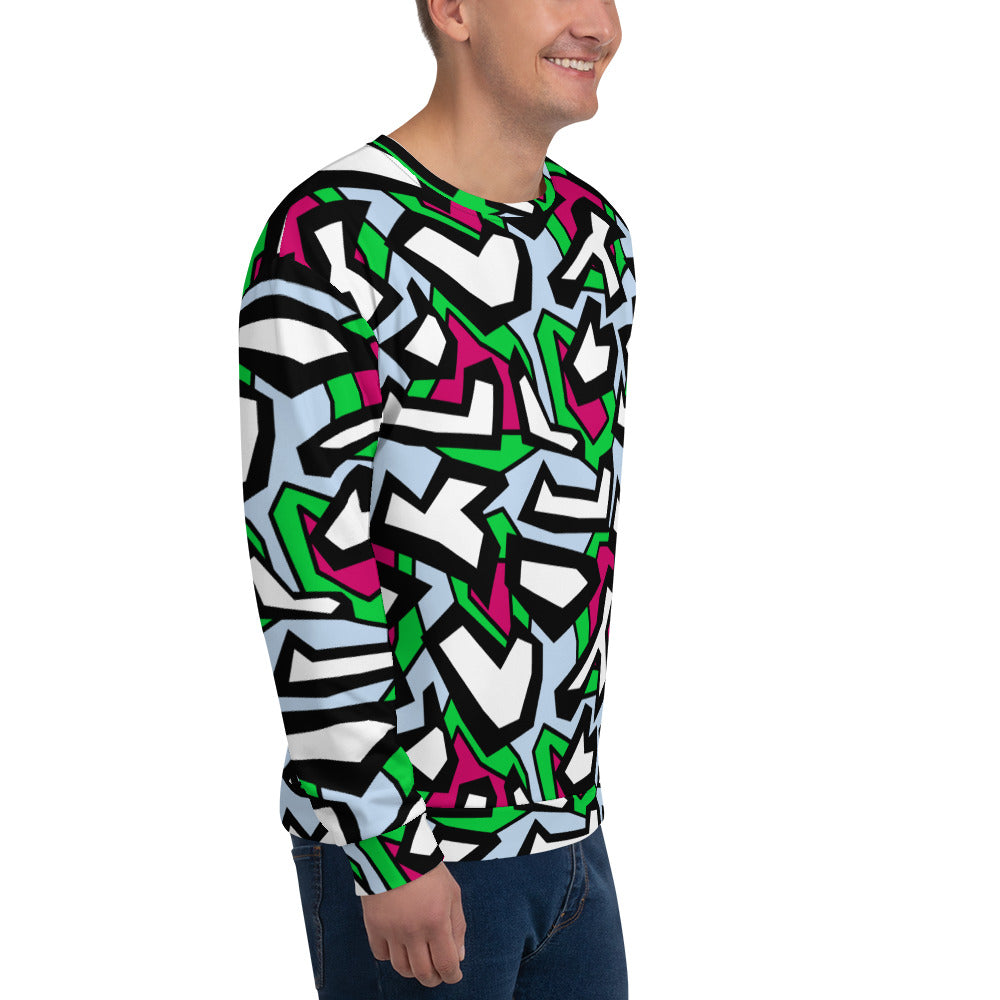 Funky patterned sweatshirt in a geometric 80s Memphis design all-over pattern, in black, white, red and green against a pale blue background on this sweater or pullover by BillingtonPix