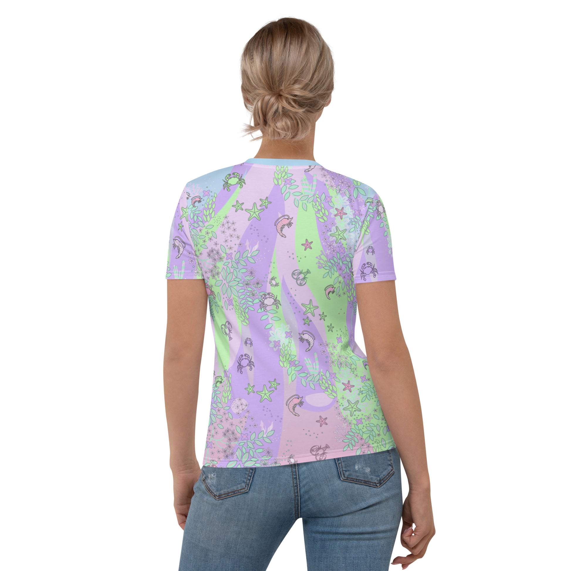 Ocean blush crustaceancore all over print sublimation t-shirt for women with a pattern of sea critters in a stripy background of pastel pink, blue, green and pink. Womens short sleeved with crew neck tee shirt by BillingtonPix