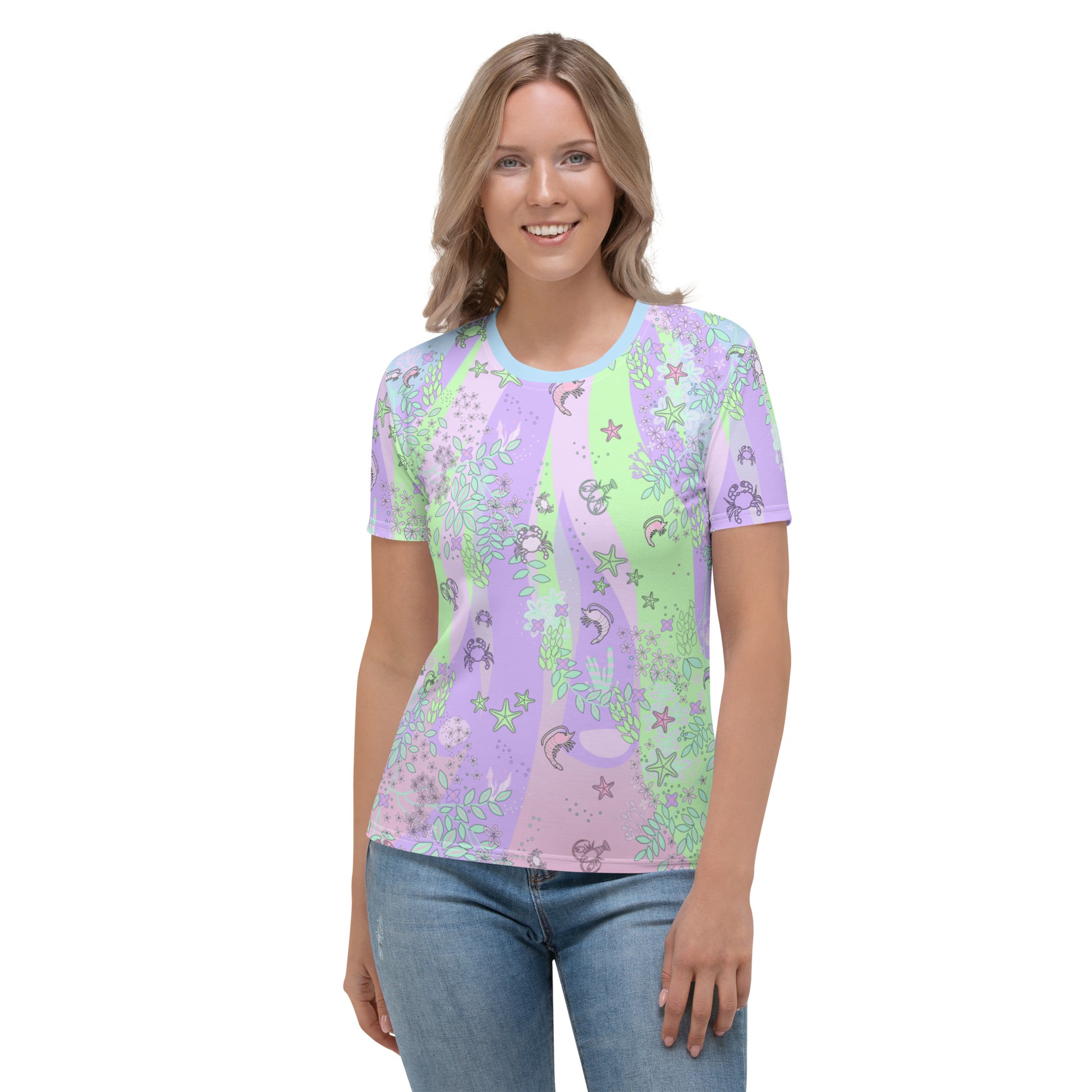 Ocean blush crustaceancore all over print sublimation t-shirt for women with a pattern of sea critters in a stripy background of pastel pink, blue, green and pink. Womens short sleeved with crew neck tee shirt by BillingtonPix