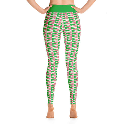 These Mid-Century Modern style yoga leggings for women consist of geometric triangular pattern in green and pink on a cream background. The bold green high waistband finishes off the look of these awesome patterned yoga tights