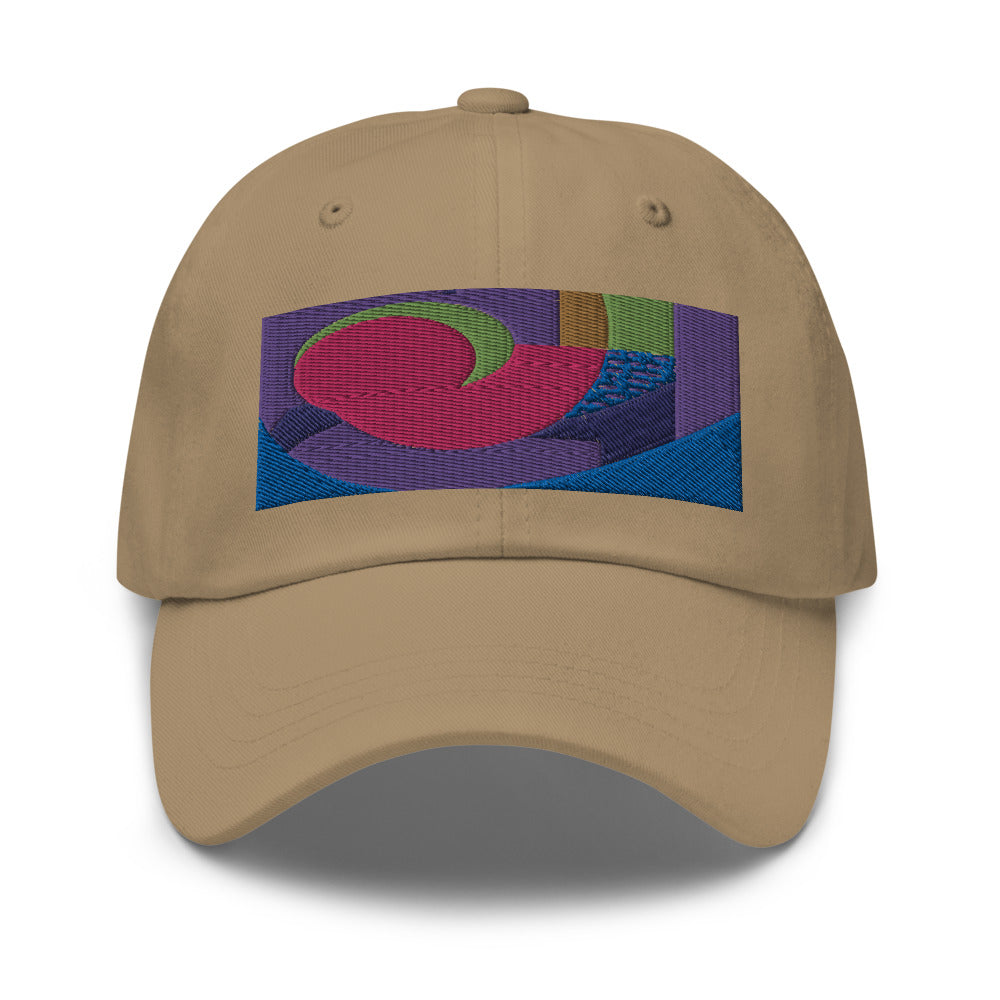 khaki dad hat with colorful rectangular logo containing blocks of colors of pink, purple, green and blue, curves and geometric shapes in a mid-century modernist abstract composition