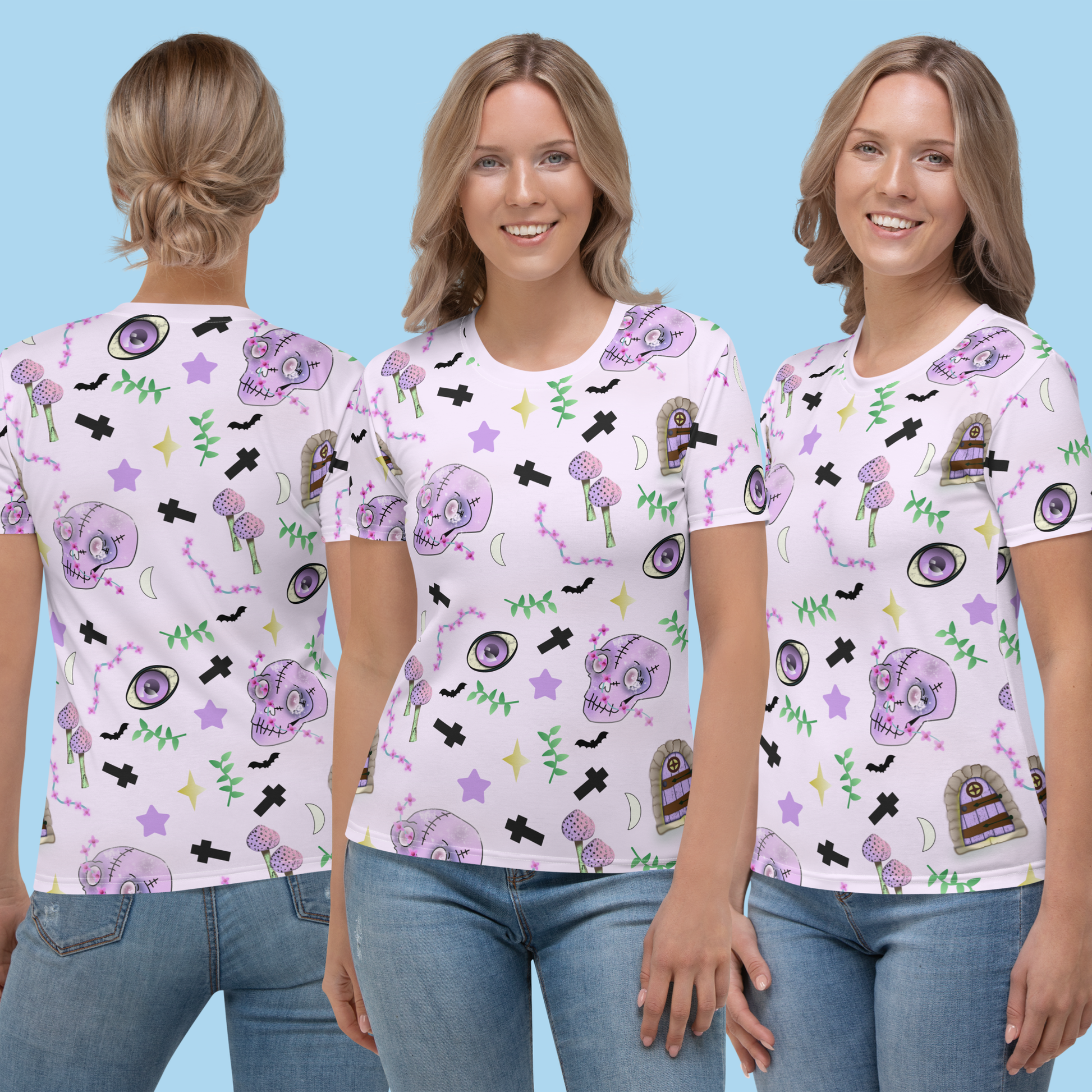 Pastel pink t-shirt for women in Harajuku pastel goth style. Features spooky skulls, crosses, mushrooms , grottos and stars on this Halloween all over print t-shirt by BillingtonPix